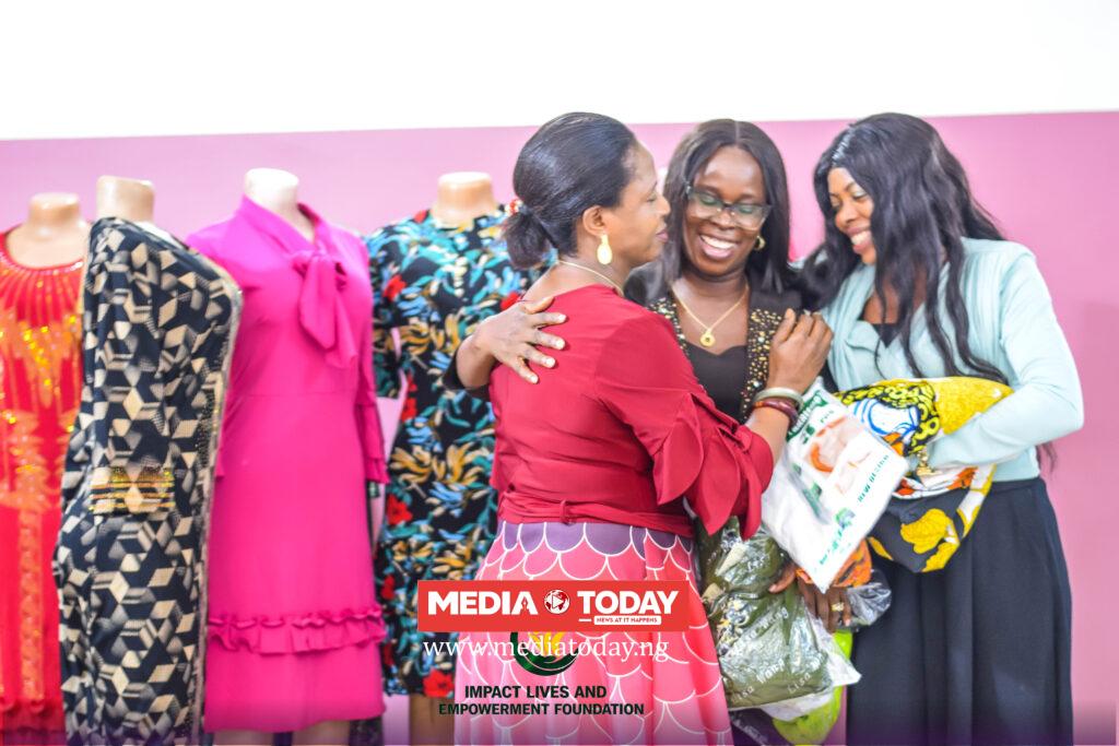 Mrs Olatunji Queen with one of the beneficiaries.