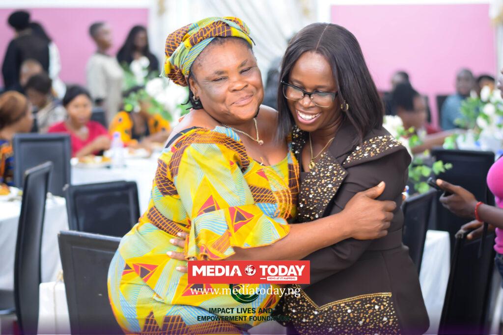 Mrs Olatunji Queen with one of the beneficiaries.