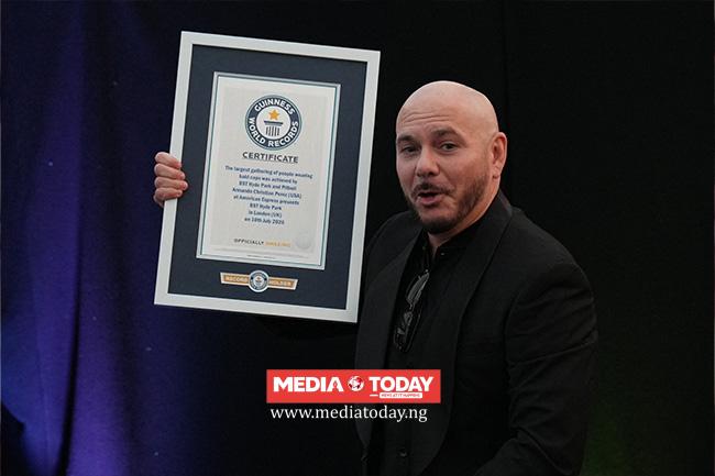 Rapper Pitbull Sets Bald Cap World Record At London Show •