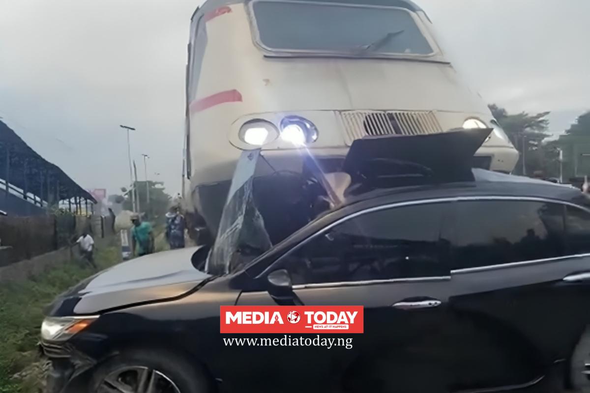 Disaster Averted As Moving Train Smashes Car In Lagos, Driver Escapes Death